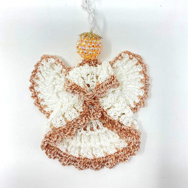 Hand crocheted angel Christmas decoration made by the sisters of monasterevmc. org/ Ange crocheté avec une auréole, décoration de Noël, faite à la main par les soeurs du monasterevmc.org