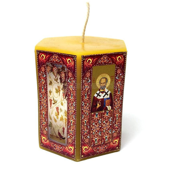 Pure beeswax hexagon pillar candle decorated with Byzantine Orthodox icons and images handmade and sold by the sisters of monasterevmc.org / Pillier hexagonal décoratif en cire d'abeille pure décoré avec des icônes et des images byzantines faits à la main par les soeurs du monasterevmc.org